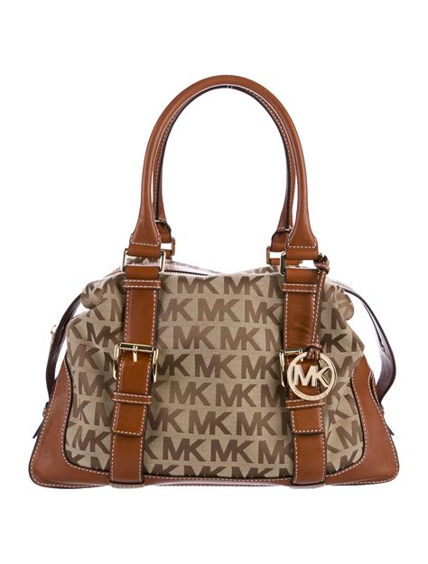 michael kors monogram in store|michael kors canvas shoulder bag.